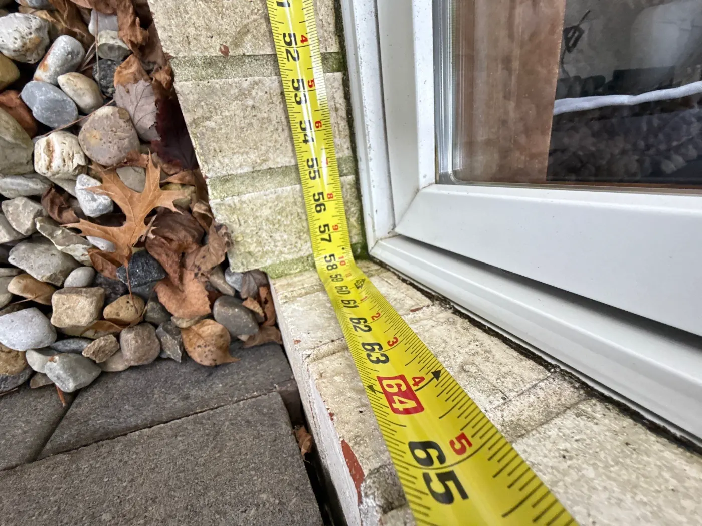 Storm-damaged window documented in Spring Mill